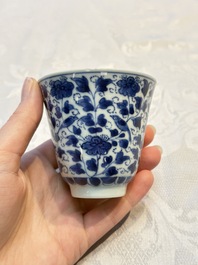 A Chinese blue and white covered ewer, a rose water sprinkler, a covered cup and saucer, jade 玉 and twin-fish mark, Kangxi