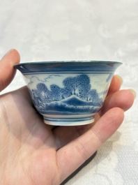 Three Japanese Arita blue and white &lsquo;Van Frytom&rsquo; cups and four shield-shaped saucers, Ming and Chenghua mark, ca. 1700