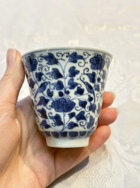 A Chinese blue and white covered ewer, a rose water sprinkler, a covered cup and saucer, jade 玉 and twin-fish mark, Kangxi