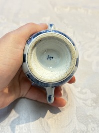 A Chinese blue and white covered ewer, a rose water sprinkler, a covered cup and saucer, jade 玉 and twin-fish mark, Kangxi