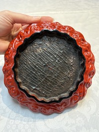 A fine Chinese red cinnabar lacquer flower-shaped 'Xi Wang Mu 西王母' dish, Ming