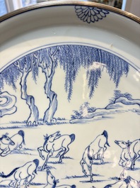 A rare Chinese silver-mounted blue and white 'Eight Horses of Mu Wang' dish, Kangxi