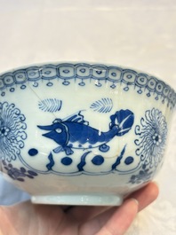 Three Chinese blue and white 'Fish' bowls and a bottle vase, Kangxi marks, 19th C.