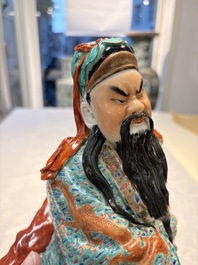 A Chinese famille rose figure of Guandi, 19/20th C.