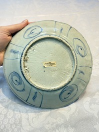 A Chinese 'Kraak' blue and white 'Hatcher Cargo' plate, Wanli