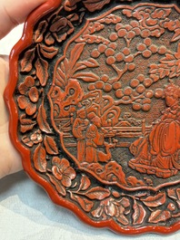 A fine Chinese red cinnabar lacquer flower-shaped 'Xi Wang Mu 西王母' dish, Ming