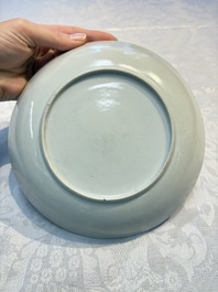 A Chinese famille rose puce-enamelled 'Riverscape' plate, cup and saucer, Jiaqing