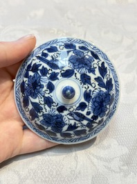 A Chinese blue and white covered ewer, a rose water sprinkler, a covered cup and saucer, jade 玉 and twin-fish mark, Kangxi