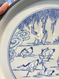 A rare Chinese silver-mounted blue and white 'Eight Horses of Mu Wang' dish, Kangxi