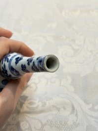A Chinese blue and white covered ewer, a rose water sprinkler, a covered cup and saucer, jade 玉 and twin-fish mark, Kangxi