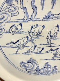A rare Chinese silver-mounted blue and white 'Eight Horses of Mu Wang' dish, Kangxi