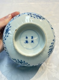 Three Chinese blue and white 'Fish' bowls and a bottle vase, Kangxi marks, 19th C.