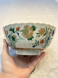 A Chinese blue and white bowl with floral design and a famille verte bowl, Kangxi