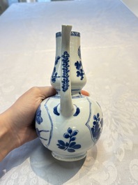 A Chinese blue and white ewer and cover with floral design, Kangxi