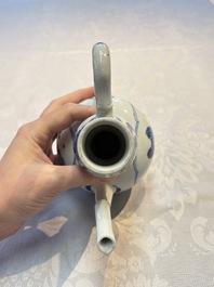 A Chinese blue and white ewer and cover with floral design, Kangxi