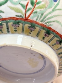 A Chinese blue and white bowl with floral design and a famille verte bowl, Kangxi