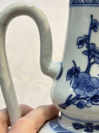 A Chinese blue and white ewer and cover with floral design, Kangxi