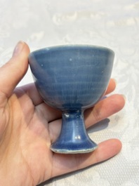 Four Chinese blue-glazed 'Hatcher Cargo' stem cups, Transitional period