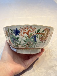 A Chinese blue and white bowl with floral design and a famille verte bowl, Kangxi