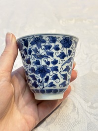 A Chinese blue and white covered ewer, a rose water sprinkler, a covered cup and saucer, jade 玉 and twin-fish mark, Kangxi