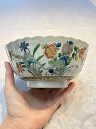 A Chinese blue and white bowl with floral design and a famille verte bowl, Kangxi