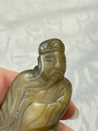 A Chinese carved mother-of-pearl figure of an official on wooden stand, 18/19th C.