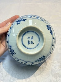 Three Chinese blue and white 'Fish' bowls and a bottle vase, Kangxi marks, 19th C.