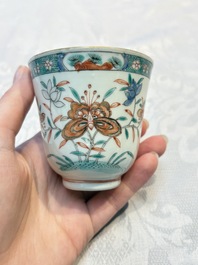 Five Chinese famille verte cups and saucers with floral design, 19th C.