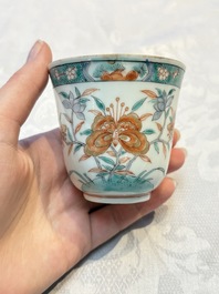 Five Chinese famille verte cups and saucers with floral design, 19th C.
