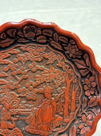 A fine Chinese red cinnabar lacquer flower-shaped 'Xi Wang Mu 西王母' dish, Ming