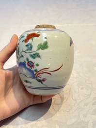 A Chinese famille rose 'Peony' jar and a 'Rooster' brush pot, Tongzhi mark, 18/19th C.