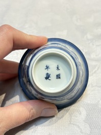 Three Japanese Arita blue and white &lsquo;Van Frytom&rsquo; cups and four shield-shaped saucers, Ming and Chenghua mark, ca. 1700