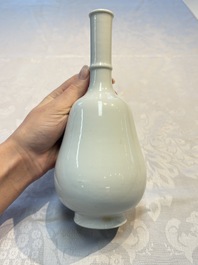 A Chinese famille rose 'Shoulao' bottle vase, signed Wang Qi 王琦, Taozhai 匋斋 seal mark, dated 1943