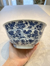 A Chinese blue and white bowl with floral design and a famille verte bowl, Kangxi