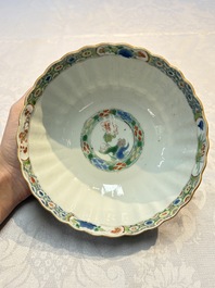 A Chinese blue and white bowl with floral design and a famille verte bowl, Kangxi
