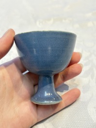 Four Chinese blue-glazed 'Hatcher Cargo' stem cups, Transitional period