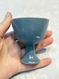 Four Chinese blue-glazed 'Hatcher Cargo' stem cups, Transitional period