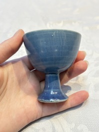 Four Chinese blue-glazed 'Hatcher Cargo' stem cups, Transitional period