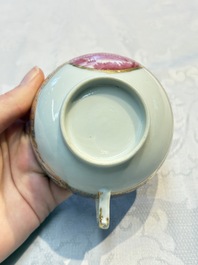 A Chinese famille rose puce-enamelled 'Riverscape' plate, cup and saucer, Jiaqing