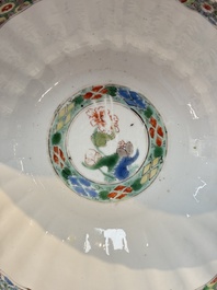 A Chinese blue and white bowl with floral design and a famille verte bowl, Kangxi