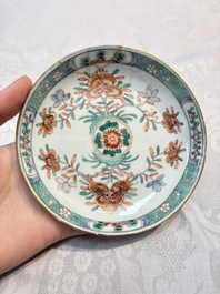 Five Chinese famille verte cups and saucers with floral design, 19th C.