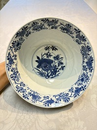 A Chinese blue and white bowl with floral design and a famille verte bowl, Kangxi