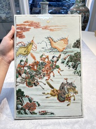 A Chinese famille verte 'Ma Yue Tan Xi 馬躍檀溪' plaque, 19th C.