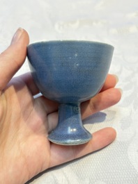 Four Chinese blue-glazed 'Hatcher Cargo' stem cups, Transitional period