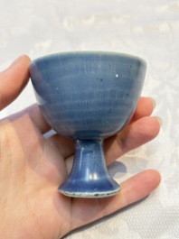 Four Chinese blue-glazed 'Hatcher Cargo' stem cups, Transitional period