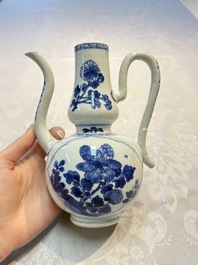 A Chinese blue and white ewer and cover with floral design, Kangxi