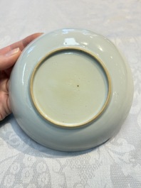 A Chinese famille rose puce-enamelled 'Riverscape' plate, cup and saucer, Jiaqing
