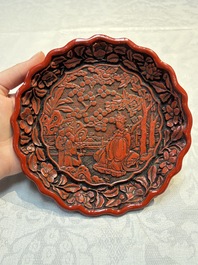A fine Chinese red cinnabar lacquer flower-shaped 'Xi Wang Mu 西王母' dish, Ming
