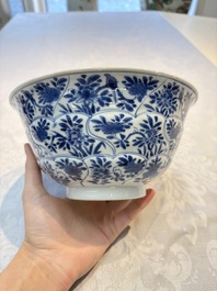 A Chinese blue and white bowl with floral design and a famille verte bowl, Kangxi