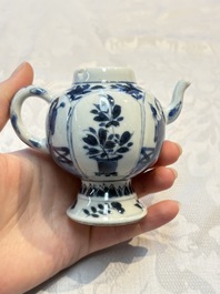 A Chinese blue and white covered ewer, a rose water sprinkler, a covered cup and saucer, jade 玉 and twin-fish mark, Kangxi